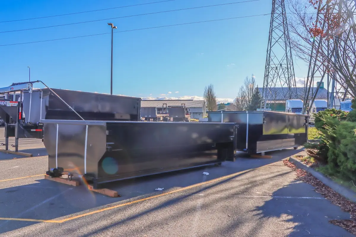 Roll-off dumpster ready for waste disposal at job site for Concrete Dumpster Rental in Monument